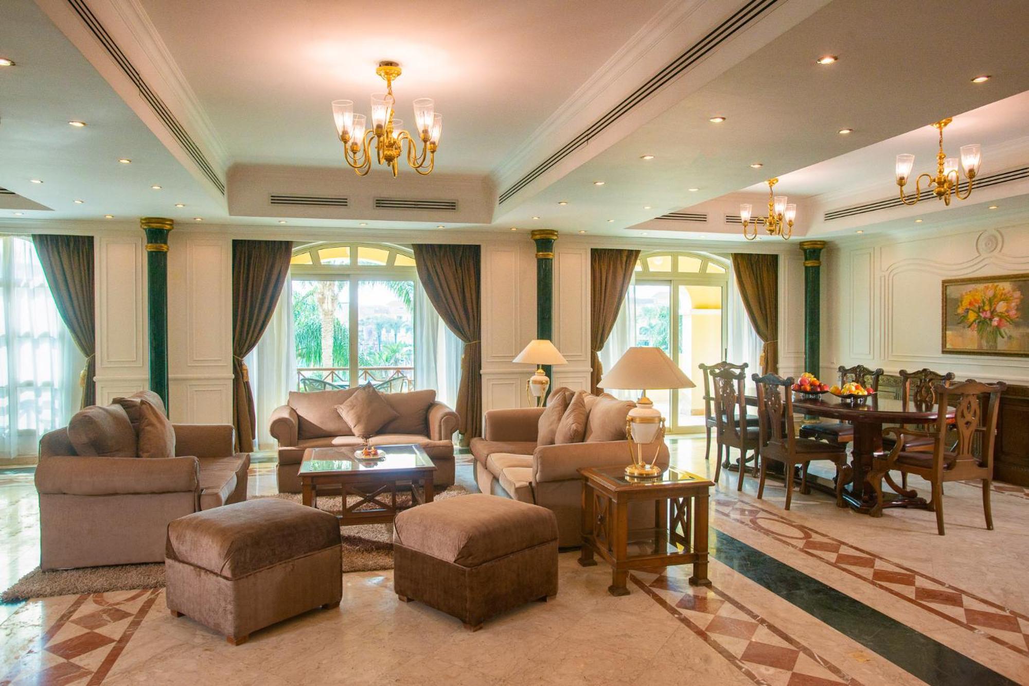 Moevenpick Hotel Cairo - Media City Giza Εξωτερικό φωτογραφία A living room in a luxury villa