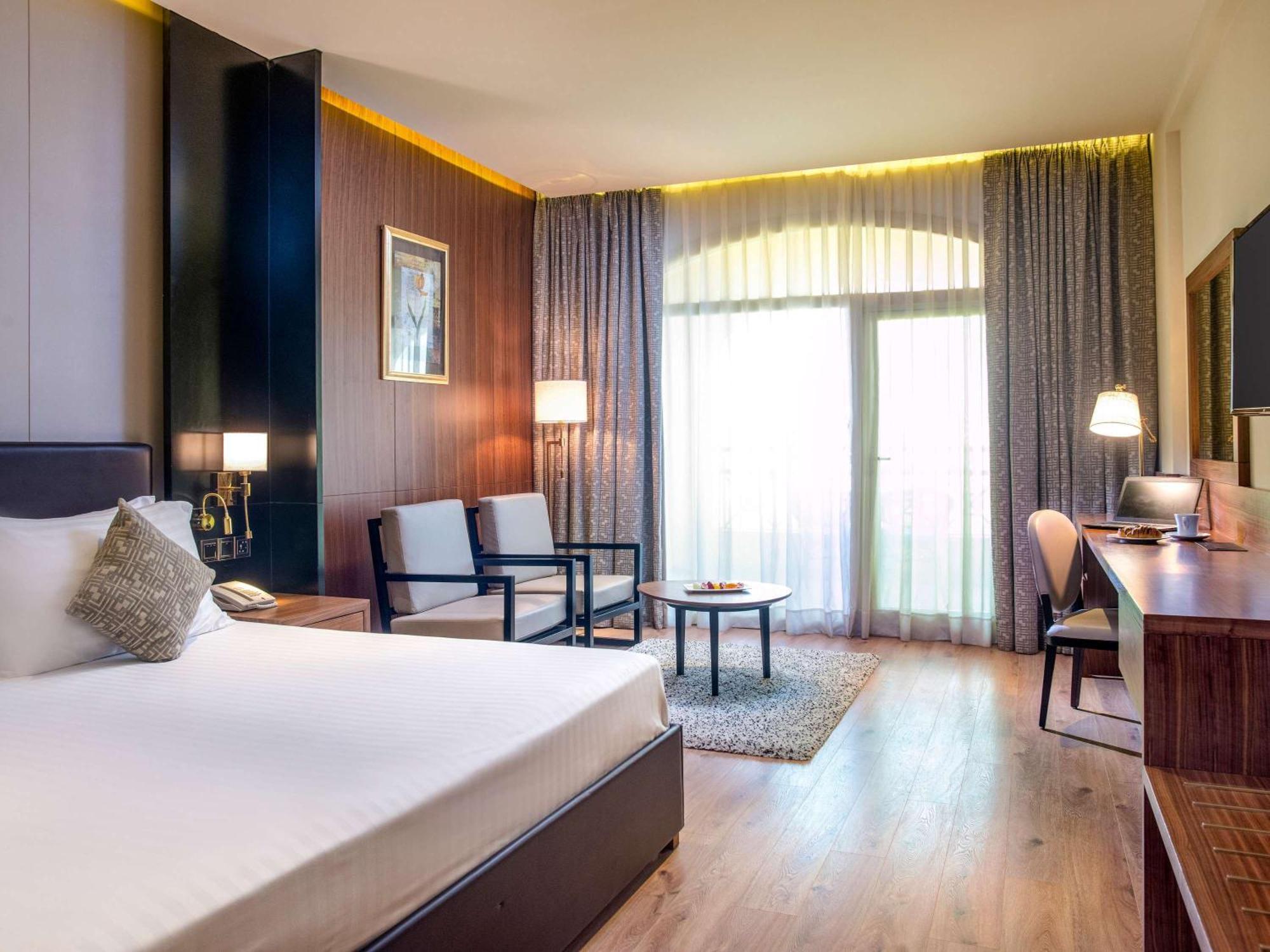 Moevenpick Hotel Cairo - Media City Giza Εξωτερικό φωτογραφία A room at the hotel