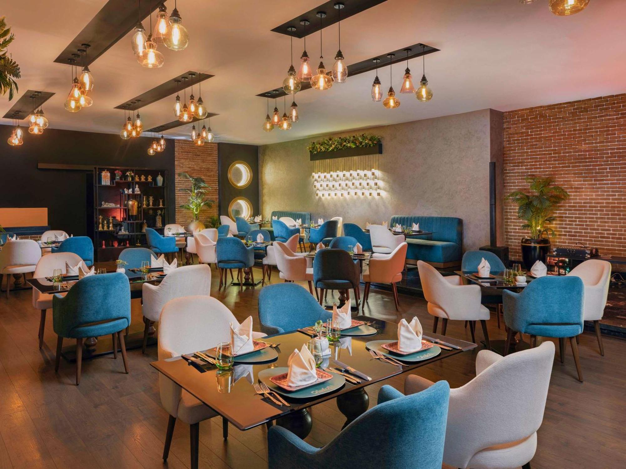 Moevenpick Hotel Cairo - Media City Giza Εξωτερικό φωτογραφία The restaurant